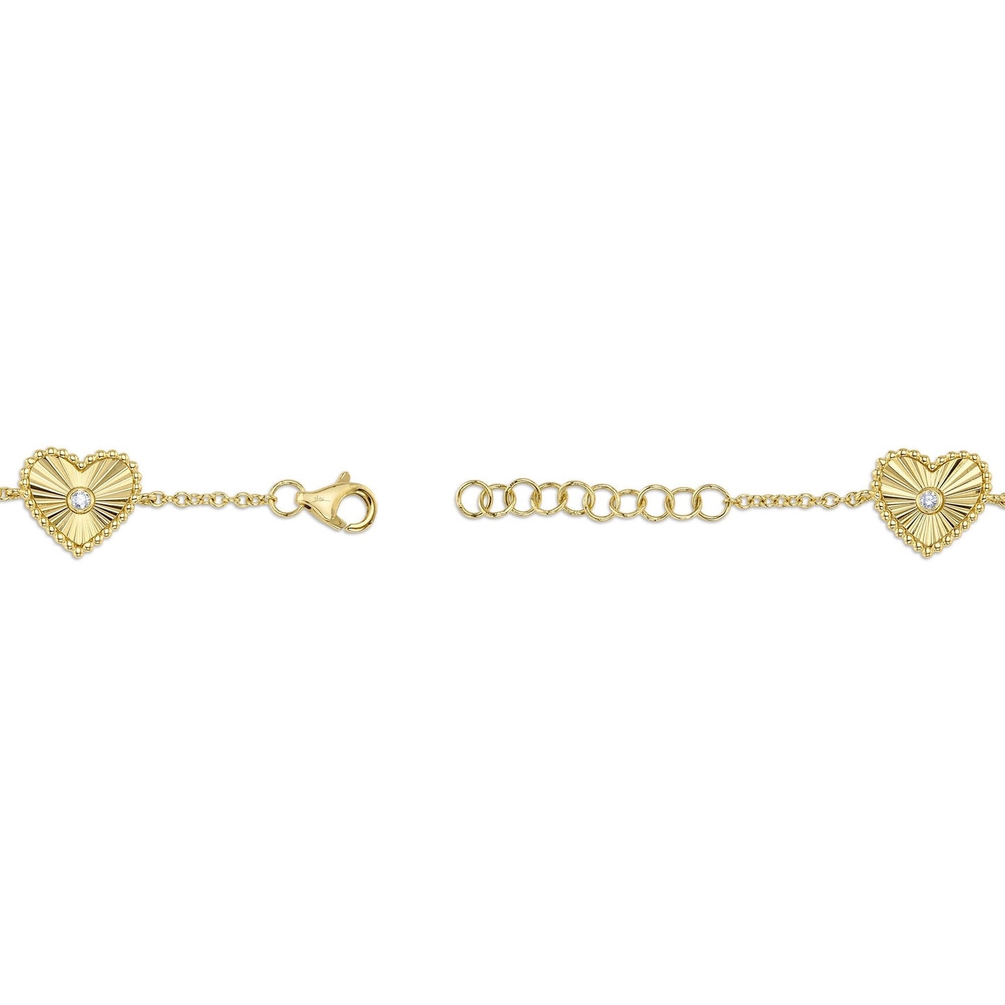 0.10CT 14K Y/G DIAMOND BEZEL RIBBED HEART BRACELET