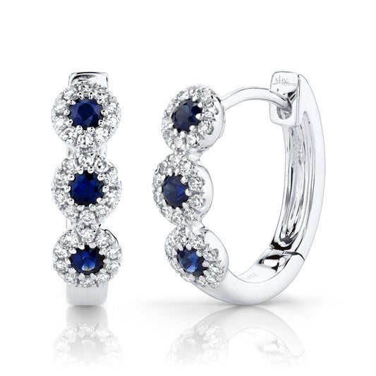 0.15CT DIAMOND & 0.30CT BLUE SAPPHIRE 14K W/G HUGGIE EARRING