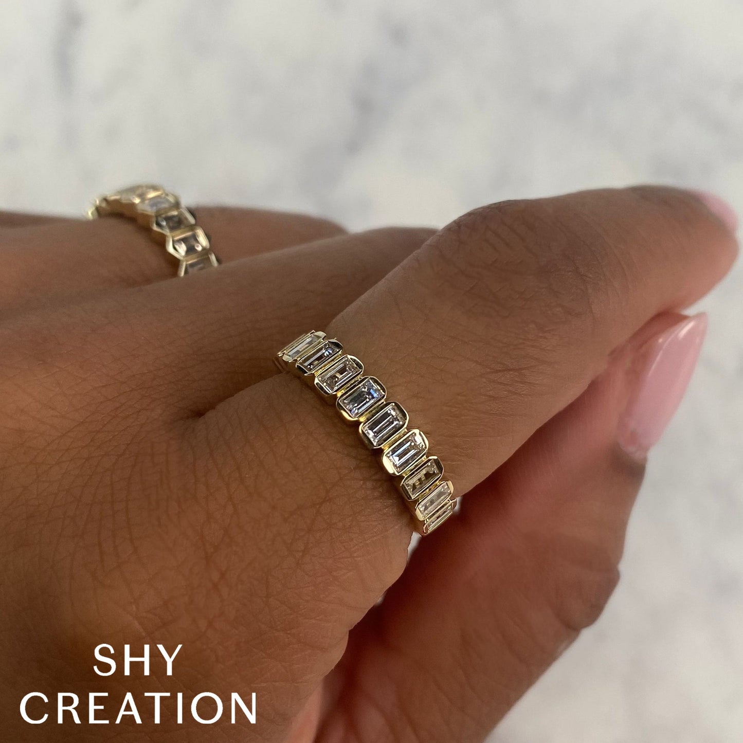 0.78CT 14K Y/G DIAMOND BAGUETTE BEZEL BAND