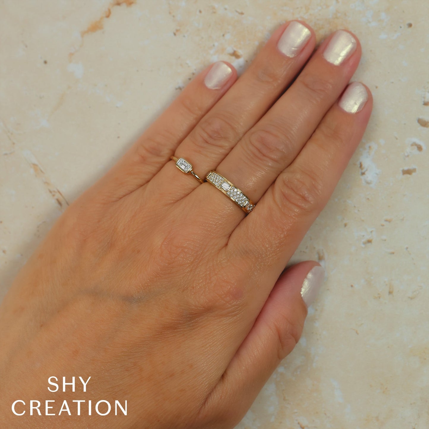 0.07CT 14K Y/G DIAMOND BAGUETTE RING
