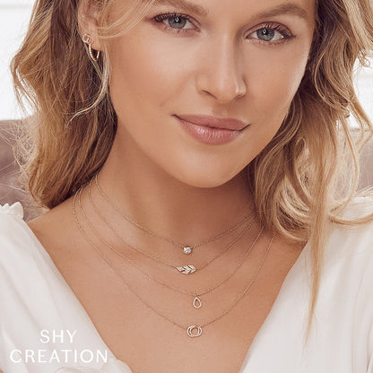 0.07CT DIAMOND LOVE KNOT CIRCLE PENDANT NECKLACE