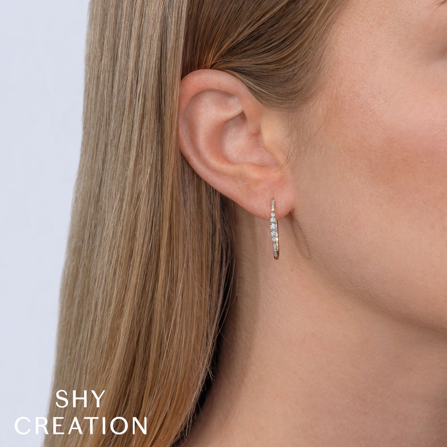 0.29CT 14K Y/G DIAMOND OVAL HOOP EARRING