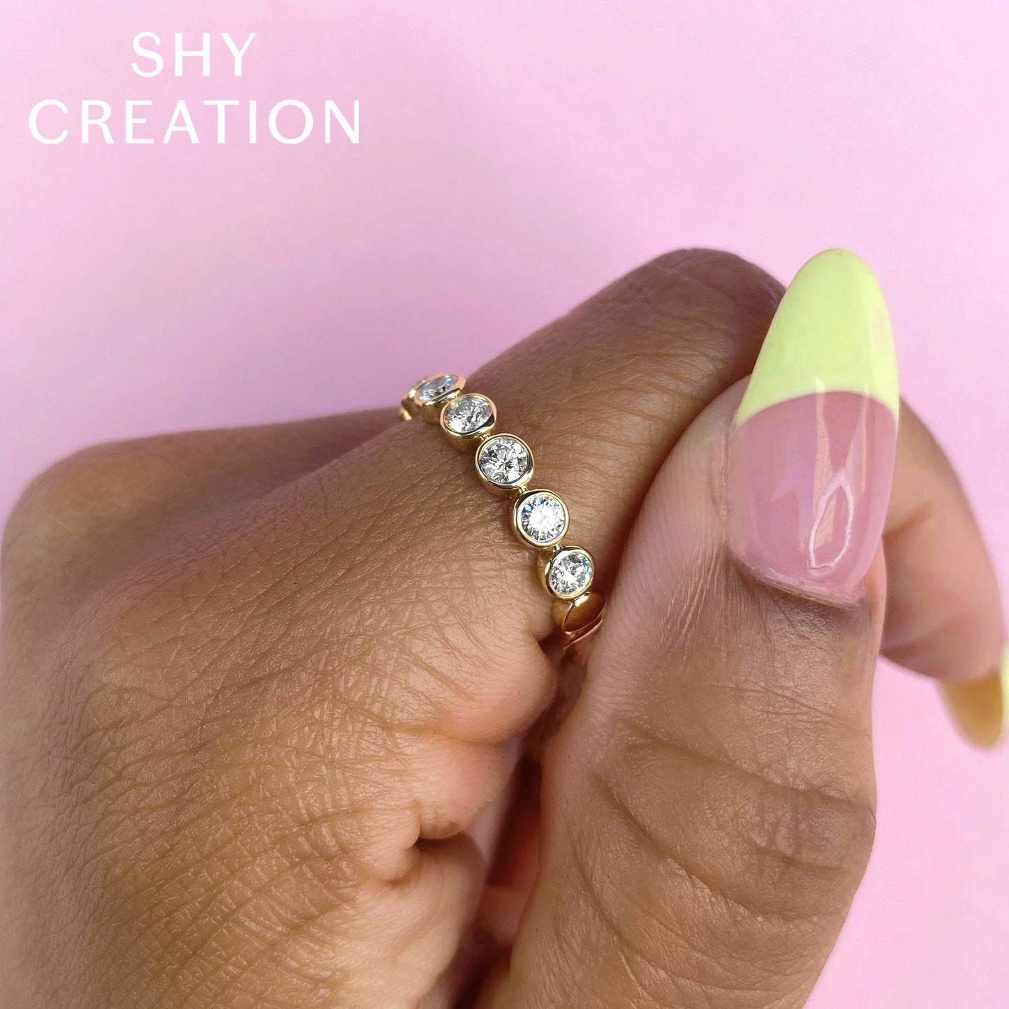 0.60CT 14K Y/G DIAMOND BEZEL BAND