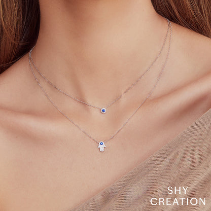 0.09CT DIAMOND & 0.08CT BLUE SAPPHIRE HAMSA NECKLACE